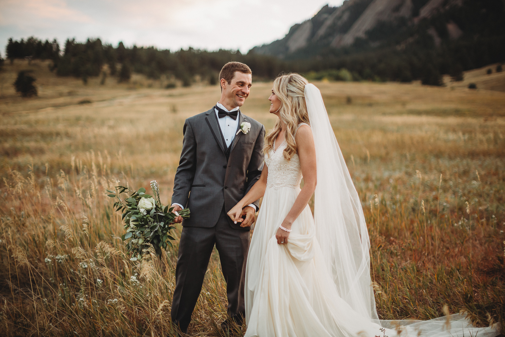bride and groom laugh at chautauqua park boulder Colorado