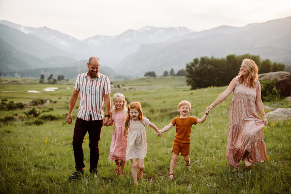 A family shares a hike in Moraine Park in Rocky Mountain National Park