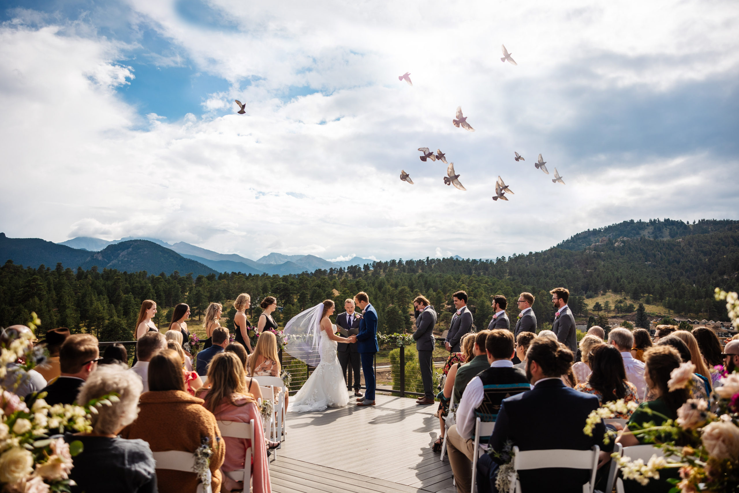 Bride and groom during their wedding ceremony at Skyview Estes Park.
