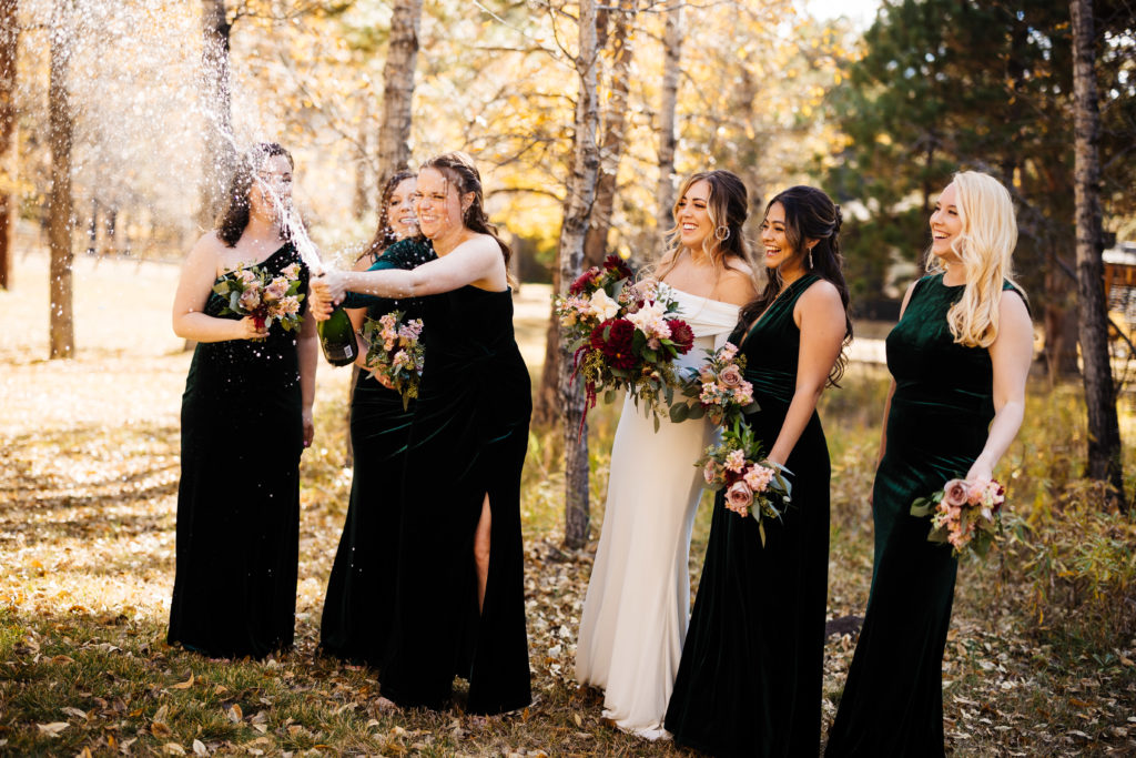 Bridesmaids celebrate with the bride at the Landing in Estes Park.