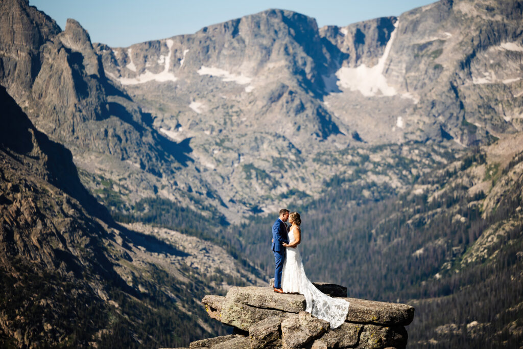 bride and groom celebrate their wedding at Trail Ridge Road in Rocky Mountain National Park.